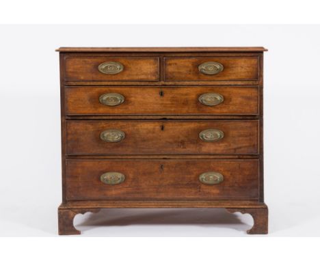 A George III mahogany rectangular chest:, the top with a moulded edge, containing two short and three long drawers, on bracke