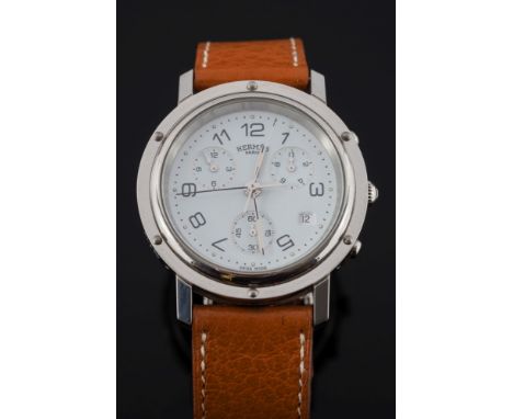 Hermes. A stainless steel quartz 'Clipper' wristwatch: the signed circular white enamel dial with centre seconds hand, date a