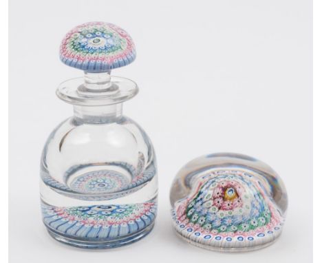 A Stourbridge concentric ring glass inkwell and cover together with a similar paperweight: each with multi coloured floral ca