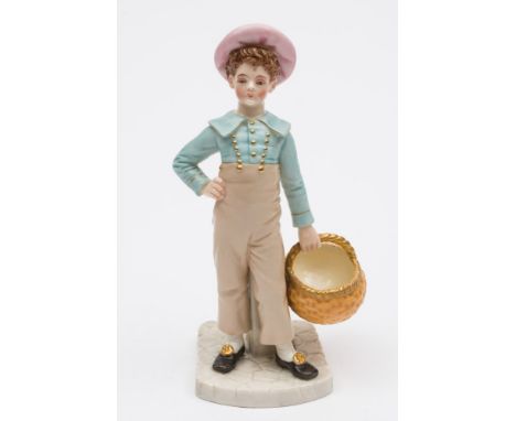 A Royal Worcester porcelain figure of a boy: modelled after James Hadley standing in high waisted trousers and pink hat, with
