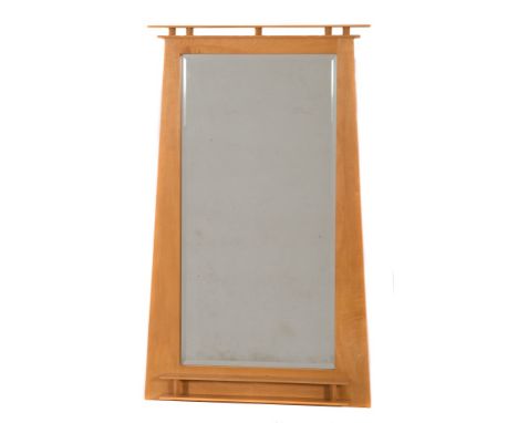 A contemporary birch wall mirror:, of tapering form having open tiered cresting and shelf to base, inset with a rectangular b