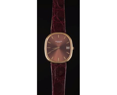 Patek Philippe. A gentleman's 18ct gold 'Ellipse' automatic wristwatch: with sunburst brown cushion-shaped dial 34mm long x 2