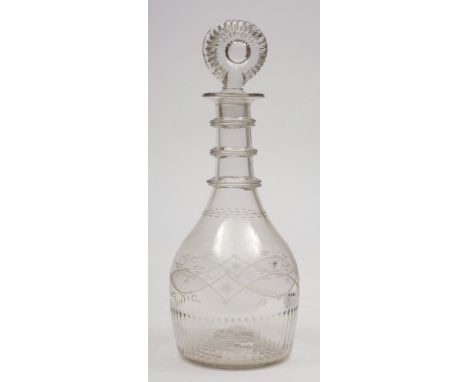 An Irish [Cork Glass Co.] decanter and stopper:  with moulded flattened stopper and fluted band to the base, triple ringed ne