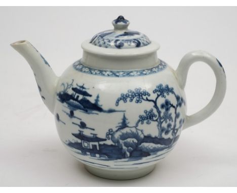 A Worcester First Period porcelain teapot and cover: painted in blue in the Cannonball pattern, hatched crescent marks, circa