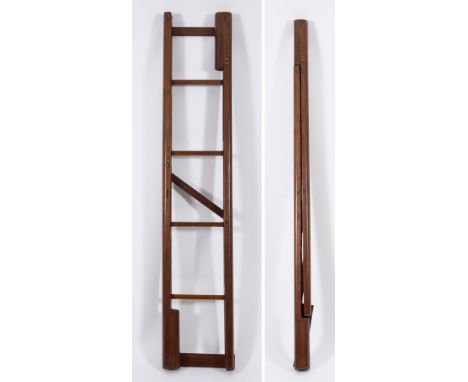A 19th Century mahogany folding pole ladder:, with six treads, 176cm (5ft 9 1/4in) long.
