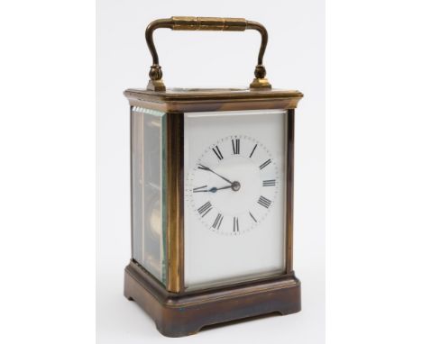 Henri Jacot, Paris, a brass carriage clock: the eight-day duration movement striking the hours on a gong with the original pl