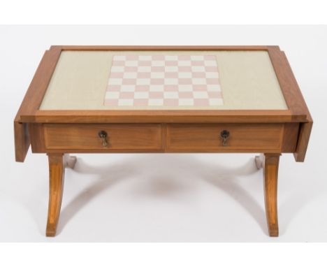 A contemporary walnut and silk panel chess table:, of sofa table design, the rectangular hinged top with inset silk glazed pa