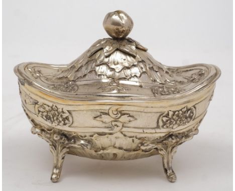A Continental plated sucriere and cover of oval outline: the domed hinged lid with apple finial, the sides with oval foliate 