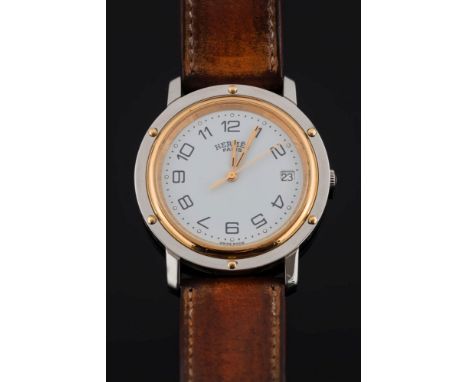 Hermes. A gentleman's two-tone stainless steel quartz 'Clipper' wristwatch: the signed circular white enamel dial with centre