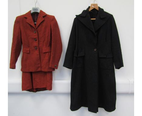 A 1940's heavy barathea wool lady's coat with triangular cut detail to front pockets, wide lapel collar and a ginger wool 194