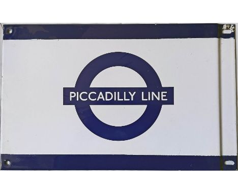 London Underground 1950s/60s enamel FRIEZE PLATE from the Piccadilly Line with the line name across the bar of the bullseye. 