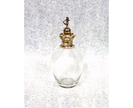 Late Victorian heavy glass ovoid decanter, the silver mounted neck with crimped rim and beaded base, and an odd silver mounte