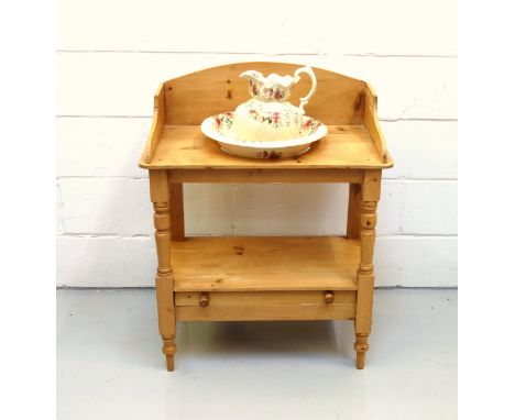 Late Victorian pine washstand with an arched galleried back, undertier and drawer below, on semi turned legs, 93.5 x 72.5 x 3