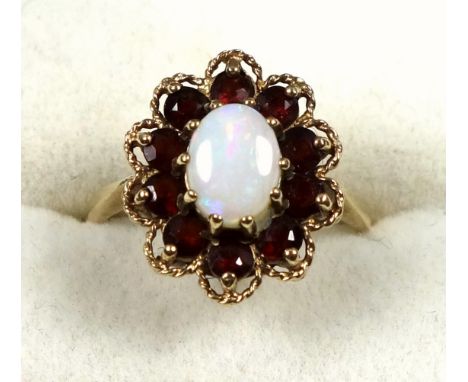 9ct gold opal and garnet ring, size Q 1/2, 3.8 grams 