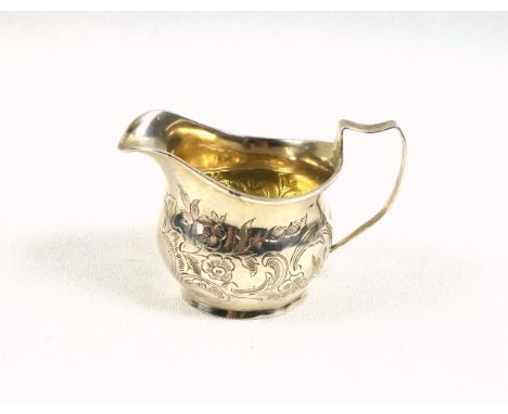 George III silver helmet shaped cream jug with bright-cut decoration, London, 1798, H.5.5cm, 49grs, (traces of gilding to int