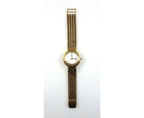 A Lady's 18ct gold Omega automatic bracelet watch, with a circular shaped case, diameter 28mm overall, a silvered dial, gold 