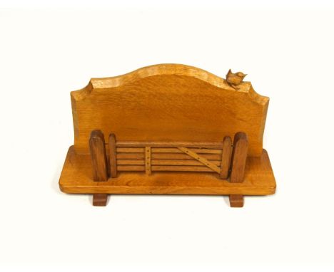 Wrenman, (Bob Hunter, Thirlby), oak letter rack, the shaped serpentine back with carved wren trademark, and 5-bar gate front,