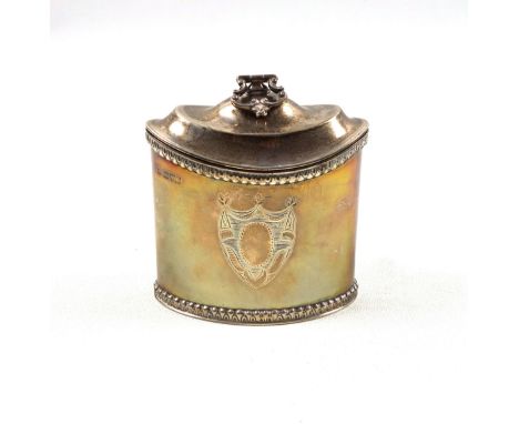 Edwardian George III style silver tea caddy of navette form, with a central vacant cartouche between a beaded rim and foot, t
