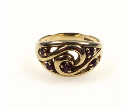 9ct gold and ruby ring with a pierced scroll design, size L, set five rubies, 3.0 grams 