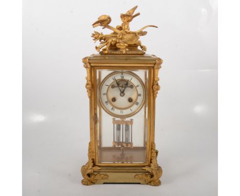 French gilt metal four-glass mantal clock, enamelled dial, visible escapement, movement with compensated mercury pendulum, st