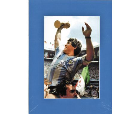 Football Diego Maradona signed 16x12 overall mounted colour photo pictured holding the world cup trophy in 1986. Diego Armand