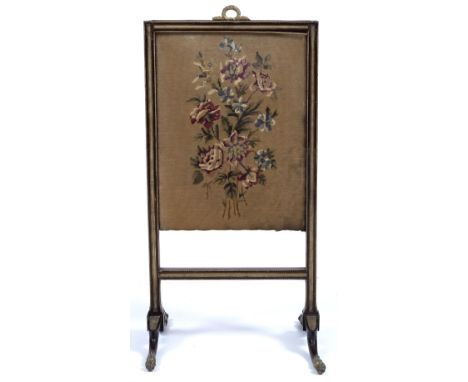 A REGENCY MAHOGANY AND GILT METAL FIRE SCREEN with a tapestry panel, stamped W.T.Lord, 39.5cm wide x 80cm high