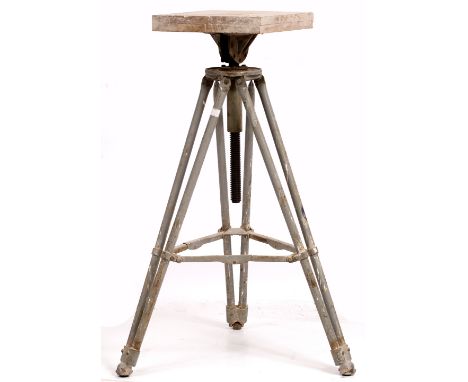 A GREY PAINTED SCULPTURE STAND with a hardwood top and tripod base supplied by Tiranti Ltd., London, the top 35cm square and 