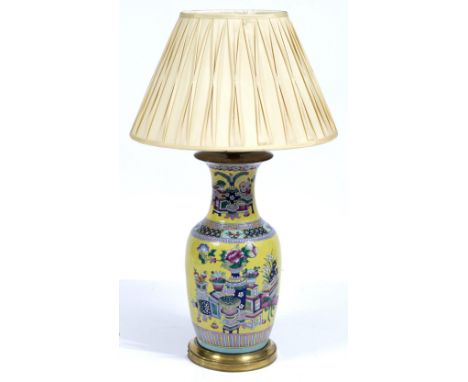 A 19TH CENTURY CHINESE YELLOW GROUND VASE of baluster form, decorated with peacocks, converted to a lamp with brass mounts, t