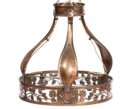 A 20TH CENTURY COPPER LIGHT FITTING with pierced foliate decoration and fittings for three bulbs, 46cm across