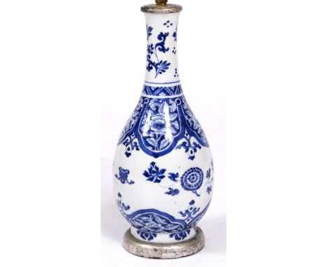 AN 18TH CENTURY CHINESE FLOWER DECORATED BOTTLE VASE later drilled for use as a table lamp, 34.5cm high overall