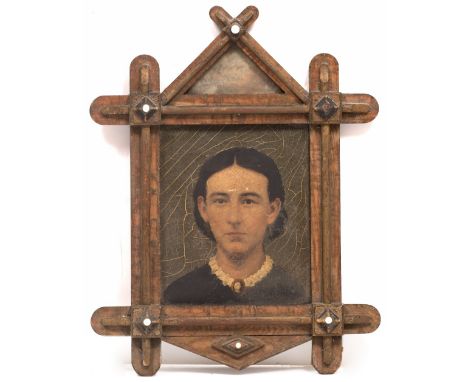 AN ANTIQUE AMERICAN PRIMITIVE HEAD AND SHOULDER PORTRAIT  oil on canvas, 28cm x 23cm, mounted in a painted pine folk art fram