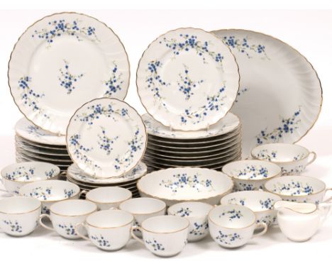 A BERMARDAUD LIMOGES FRENCH PORCELAIN MIOSOTIS PATTERN EIGHT SETTING DINNER SERVICE together with a Royal Worcester milk jug 