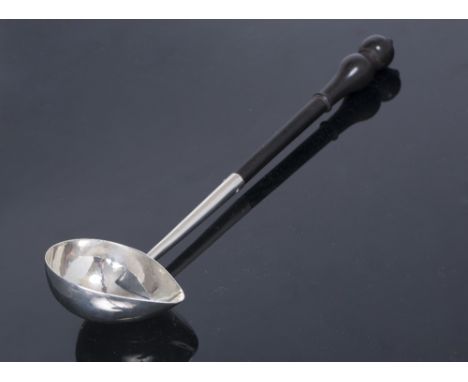 A GEORGE II SILVER PUNCH LADLE with marks for London 1749 with a turned ebony handle, the bowl inscribed to the reverse, pres