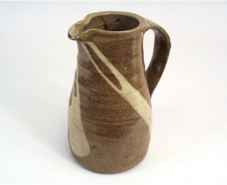 LEACH POTTERY. A Leach Pottery quart jug. Height 23.5cm. Leach Pottery &amp; unidentified potter's mark.