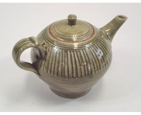 DAVID LEACH. A David Leach teapot with fluted decoration. Width 25cm. Unmarked. Purchased from the Lowerdown Pottery.