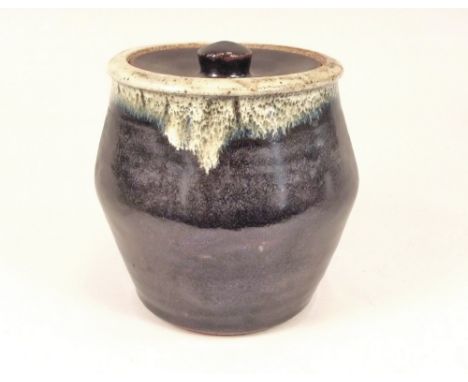 GLEN LEWIS LEACH POTTERY. A Leach Pottery lidded jar by Glen Lewis. Faint marks obscured by glaze. Height 15cm. Note: Former 