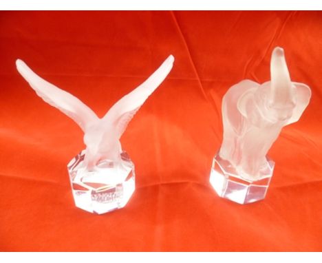 TWO LATE 20TH CENTURY GOEBEL FROSTED GLASS PAPERWEIGHTS, one in the form of an elephant and one an eagle, on clear hexagonal 