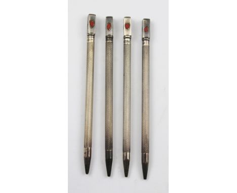 A SET OF FOUR SILVER COLOURED METAL AND ENAMEL BRIDGE SUITE MARKERS, each with a knurled shaft, stamped "Sterling" 