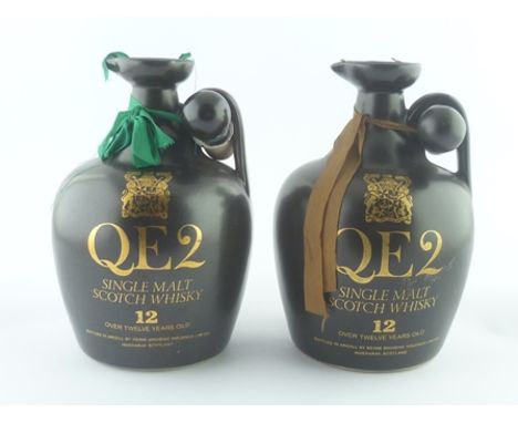 TWO QE2 SINGLE MALT SCOTCH WHISKY FLASKS, aged 12 years, 48.6% vol., 75cl in ceramic flasks with stoppers 