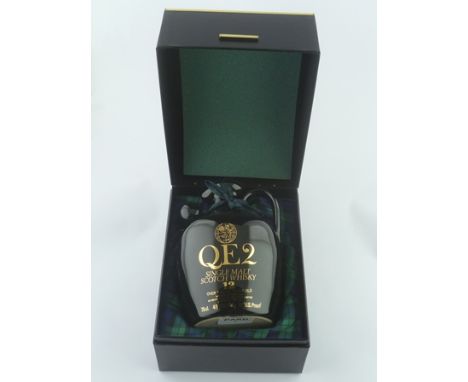 QE2 SINGLE MALT SCOTCH WHISKY aged 12 years, 48.6% vol., 75cl in ceramic flask with stopper and presentation box 