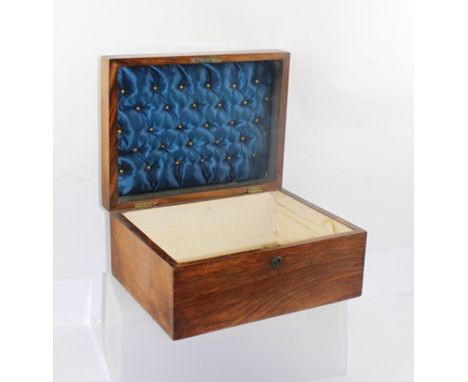 A VICTORIAN WALNUT VENEERED JEWEL/TRINKET BOX, having figured cushion top with inset handle, padded and pinned silk lined lid