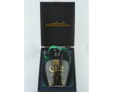 QE2 SINGLE MALT SCOTCH WHISKY aged 12 years, 48.6% vol., 75cl in ceramic flask with stopper and presentation box 