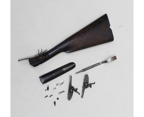 A COLLECTION OF 1870 HAMMER SIDELOCK SHOTGUN PARTS with rounded action, two hammer locks for a shotgun engraved with hunting 