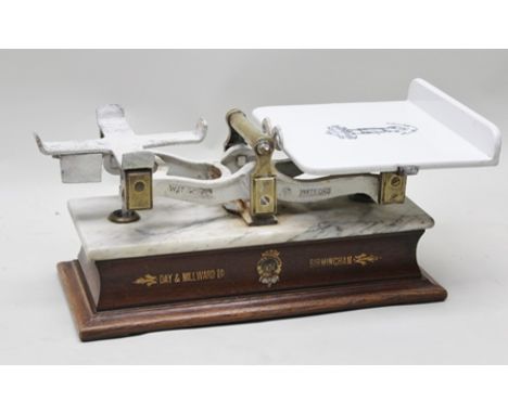 W & T AVERY LTD., WATFORD A SET OF SHOP COUNTER BALANCE SCALES with white ceramic bed, central brass handle, marble and oak r