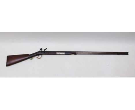 A FLINTLOCK FOWLING PIECE with baluster barrel made by Evans (post 1805) with 20" barrel, approximately 16 bore 