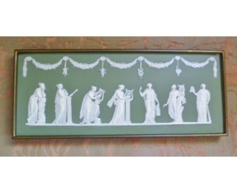 A CLASSICAL FRIEZE PANEL on a sage green ceramic ground with cameo decoration of figures, muses, beneath swags, possibly Wedg
