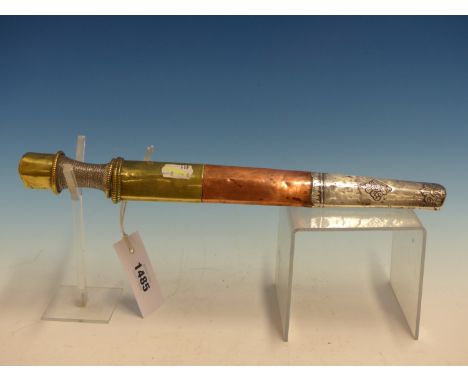 A MALAYSIAN SINGLE EDGED DAGGER WITH SILVER WIRE BOUND HANDLE, THE COPPER AND BRASS SCABBARD WITH A SILVER TIP CHASED WITH A 