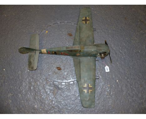 A GERMAN WORLD WAR II MODEL WAR PLANE POWERED BY A LIVE FUEL ENGINE, THE WINGSPAN.   W 85cms.
