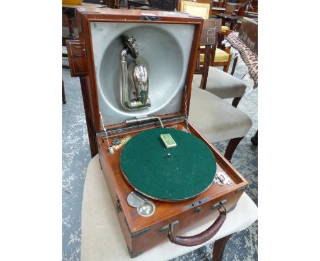 A DECCA WIND UP GRAMOPHONE RETAILED BY ALFRED HAYS, THE PLAYING ARM FITTING INTO THE ALUMINIUM SOUND BOX WITHIN THE LID. THE 