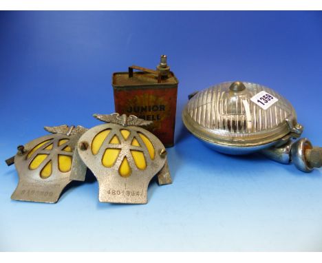 A LUCAS FOG LAMP.  Dia. 15cms.  TWO WING TOPPED AA BADGES, TOGETHER WITH A JUNIOR SHELL CAN FOR CLEANING AND AUTOMATIC LIGHTE